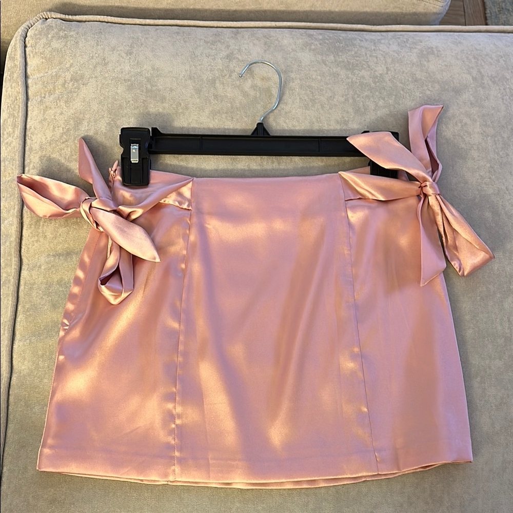 Elegant Pink Satin Skirt with Bow Accents
